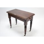 A 19th century mahogany occasional table with moulded edge & rounded corners to the rectangular top,