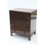 An inlaid-mahogany small chest fitted four long graduated drawers with lion-mask ring handles, &
