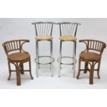 A pair of aluminium bar stools with hardwood circular seats; & a pair of cane conservatory chairs.