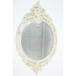 A similar large white painted & carved wood frame oval wall mirror inset bevelled plate, 55” x 32”.