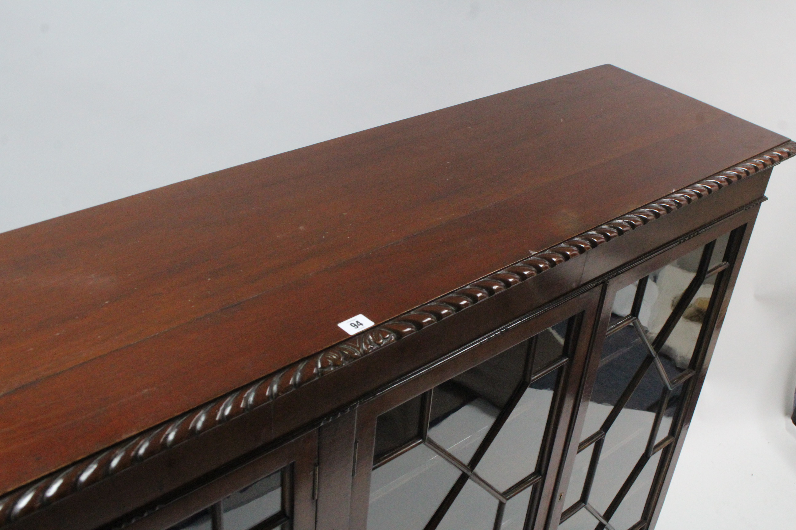 A 19th century-style mahogany bookcase with carved gadrooned edge, with five adjustable shelves - Image 3 of 5