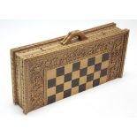 A modern eastern-style games compendium in carved wood box.