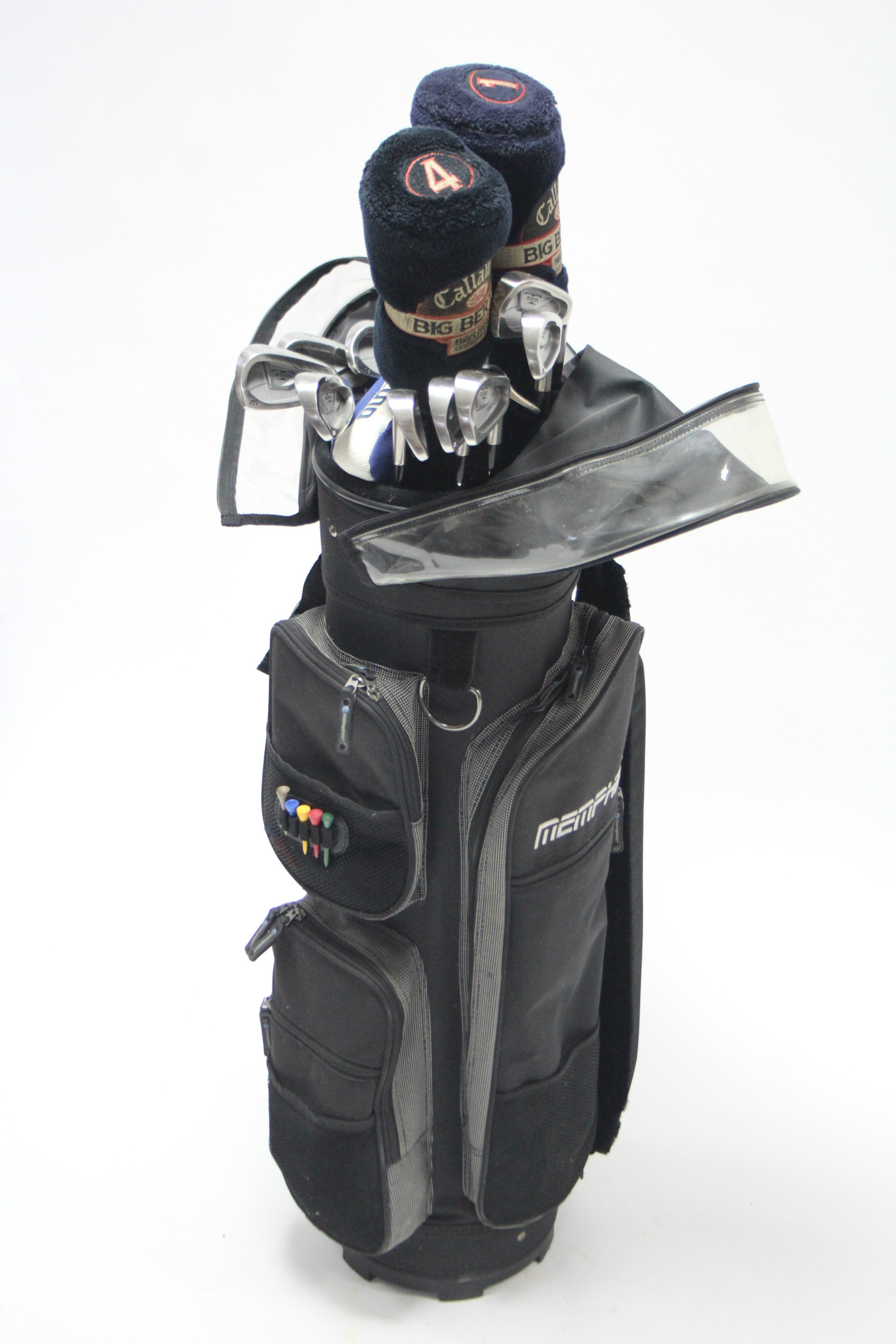 A set of thirteen Mizuno steel-shafted golf clubs with a Memphis gold bag.