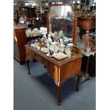 A mid-20th century burr-walnut bedroom pair comprising a twin-door wardrobe, 48” wide x 78¾” high,