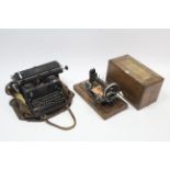 A Frister & Rossman hand sewing machine, with case; & an Imperial typewriter.