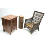 A teak three-drawer bedside chest, 20¾” wide; together with a wicker conservatory chair; an oval