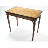 A 19th century figured mahogany card table inset green baize to the rectangular fold-over top, & on