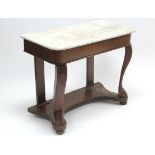 A Victorian mahogany marble-top washstand on carved cabriole legs, with shaped pot board, & on bun