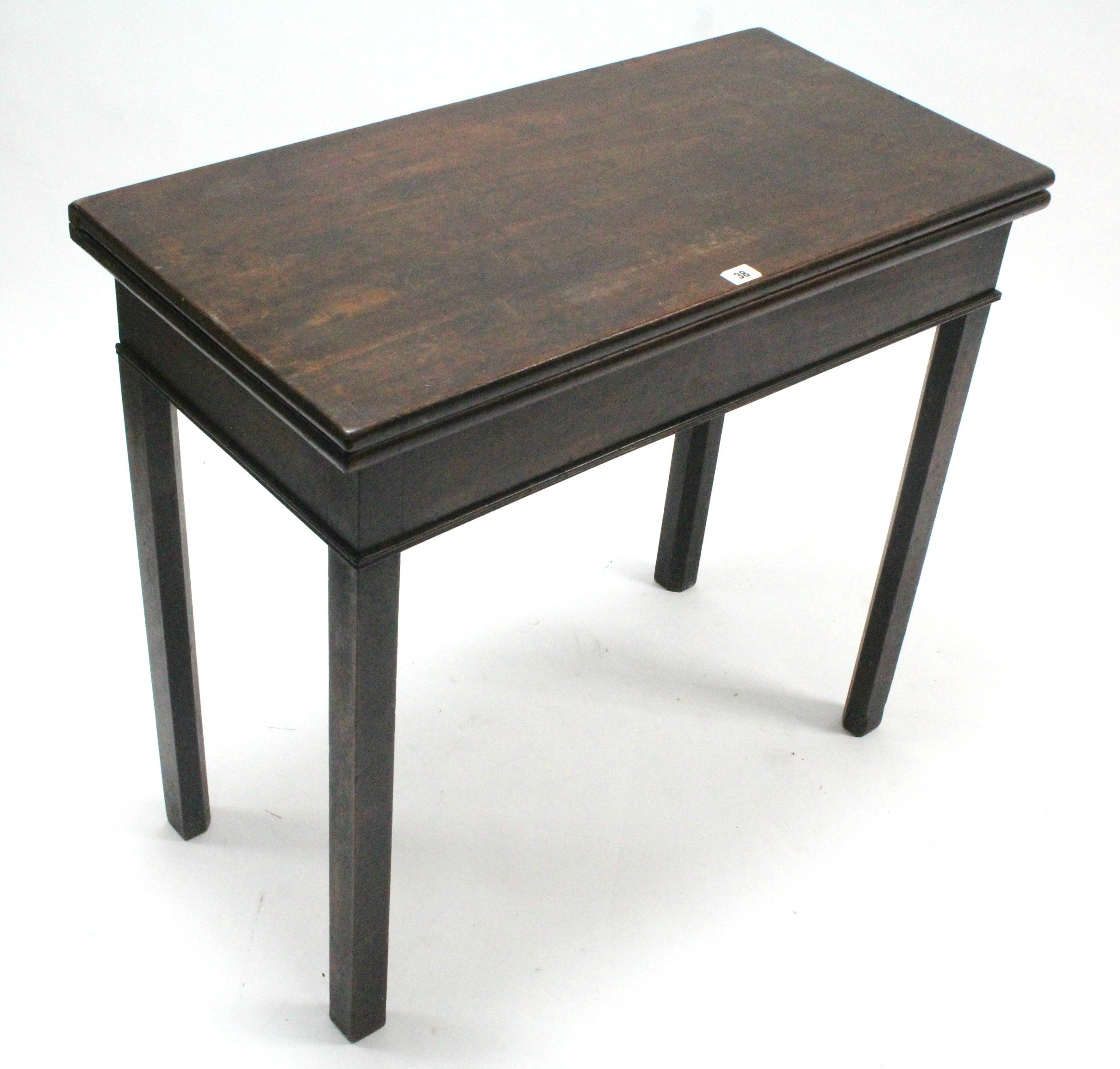 A 19th century mahogany tea table with rectangular fold-over top & on square chamfered legs, 32”