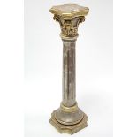A gold & silver composition pedestal with fluted centre column & on stepped base, 39¾” high.