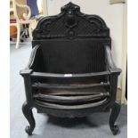 A 19th century-style black painted cast-iron fire grate, 19” wide x 26” high.