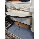 A wrought-metal marble-top console table, 36” wide.