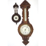 A late 19th/early 20th century aneroid wall barometer, the white enamel dial signed “Atichinson & Co