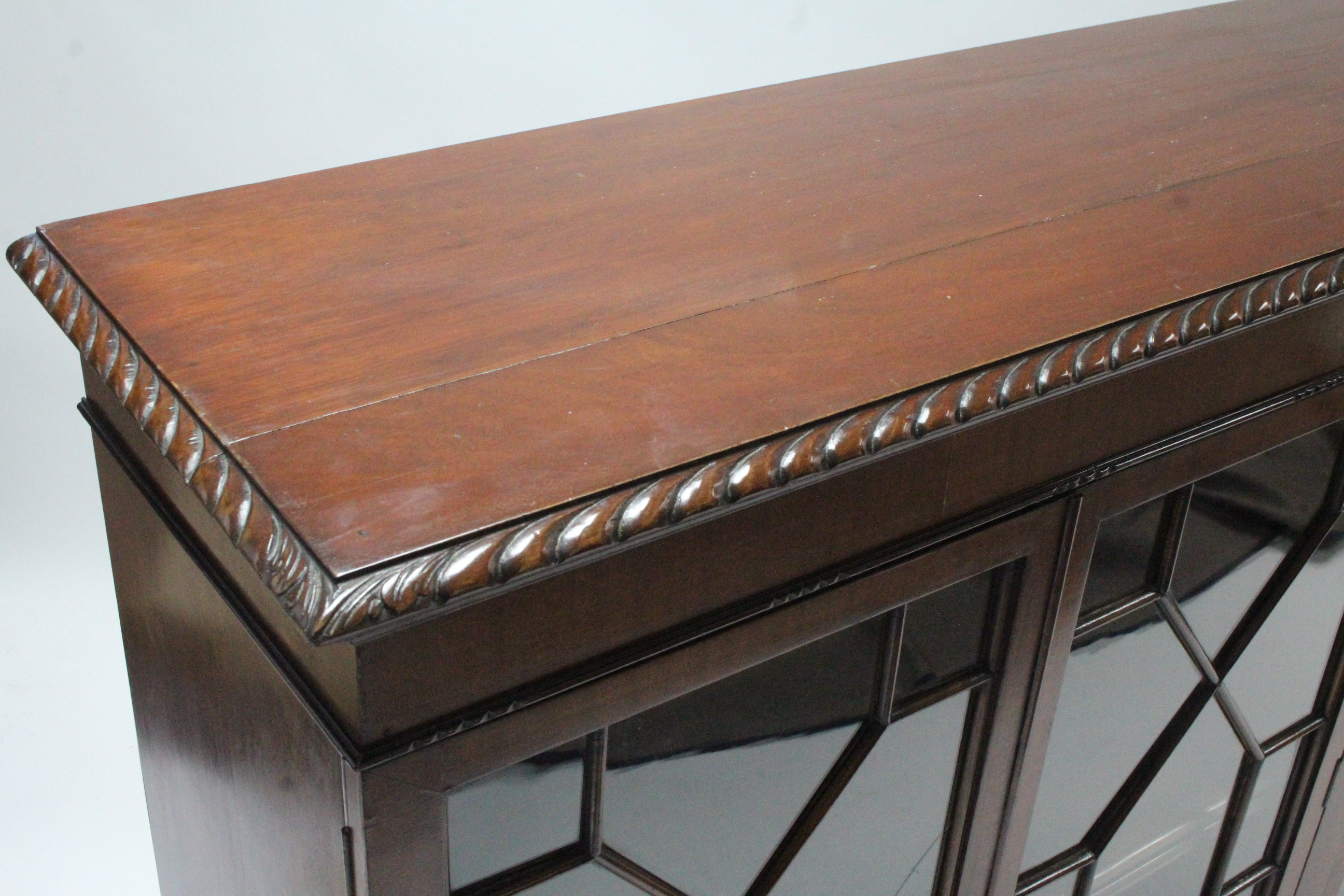 A 19th century-style mahogany bookcase with carved gadrooned edge, with five adjustable shelves - Image 2 of 5