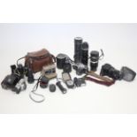 An Ajahi Pentax “Spotmatic F” camera; together with three other cameras; various camera accessories;