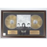 AN AUTHENTIC MEMORABILIA 24CT. GOLD LIMITED EDITION DISC “QUEEN GREATEST HITS III” (Ltd. Ed. No.