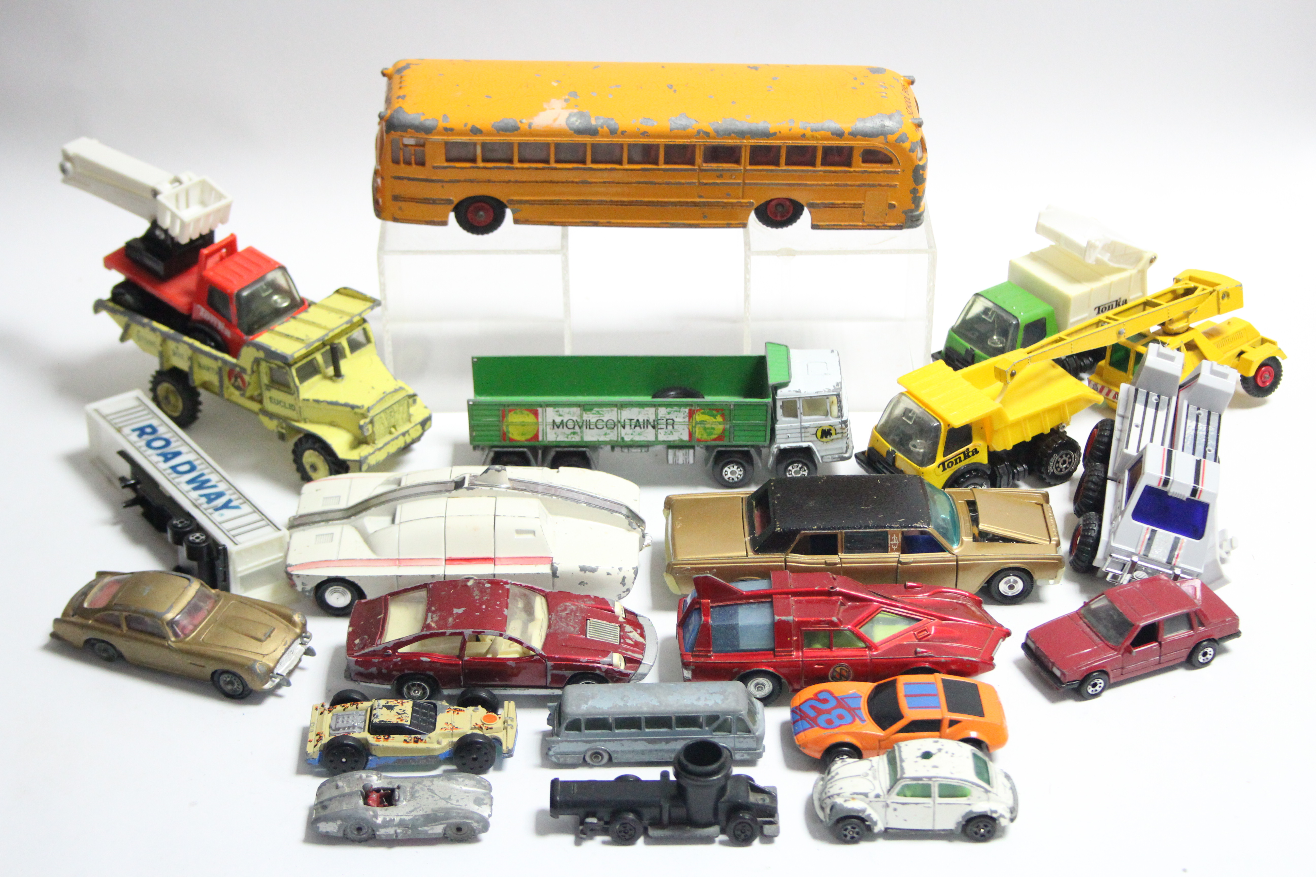 A Dinky Super toys scale model “Wayne Bus”; a Dinky scale model “Maximum Security Vehicle” (No.105);