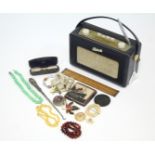 A Roberts “Revival” transistor radio; together with a replica “R.M.S. Lusitania” medal, boxed; a