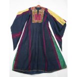 Two African embroidered ladies gowns; two ditto child’s jackets; a mid- 20th century mauve ball-
