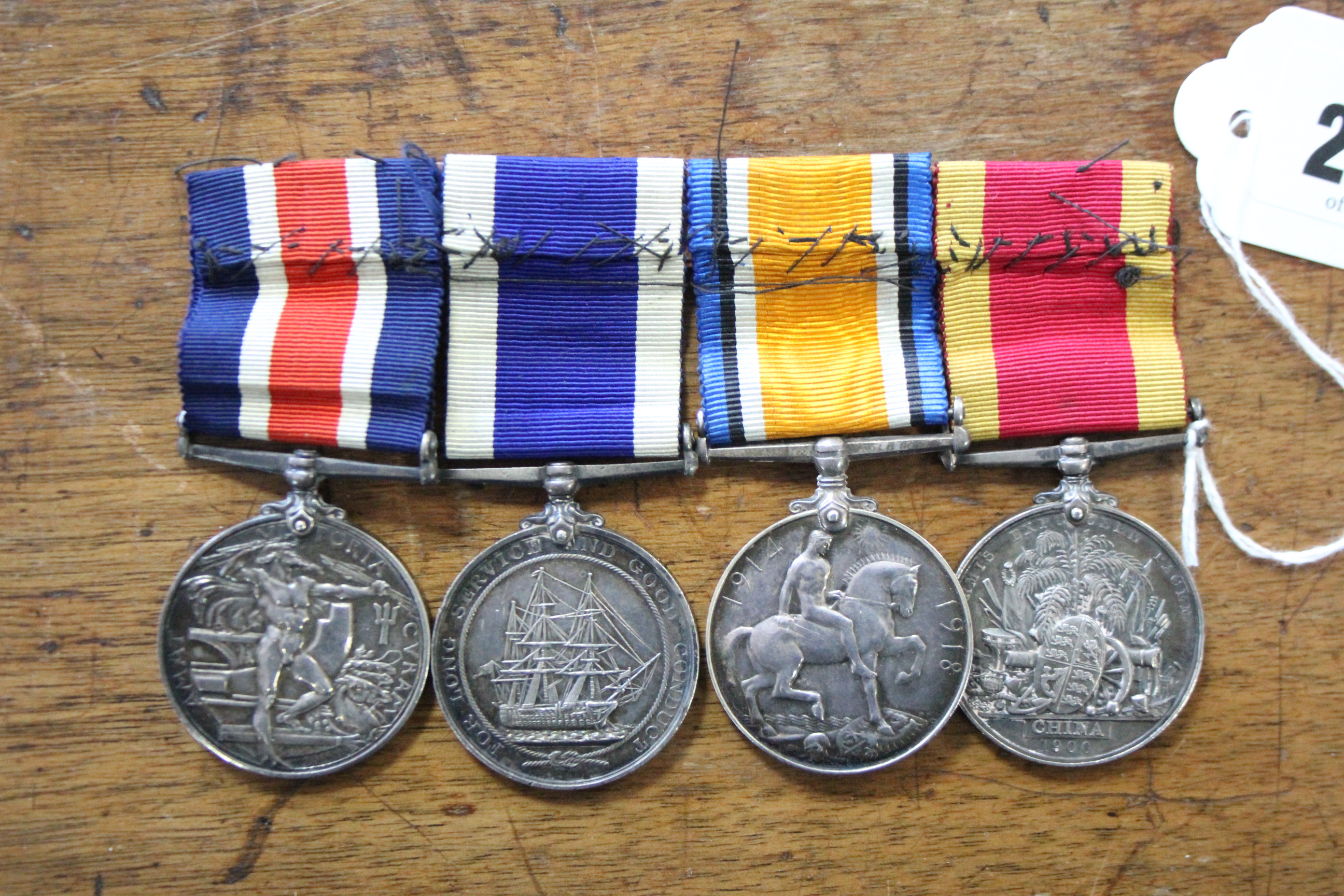 A GROUP OF FOUR NAVAL MEDALS, to Cpl/Sgt. F. A. BODGER, R. M. A., comprising: China War Medal - Image 2 of 7
