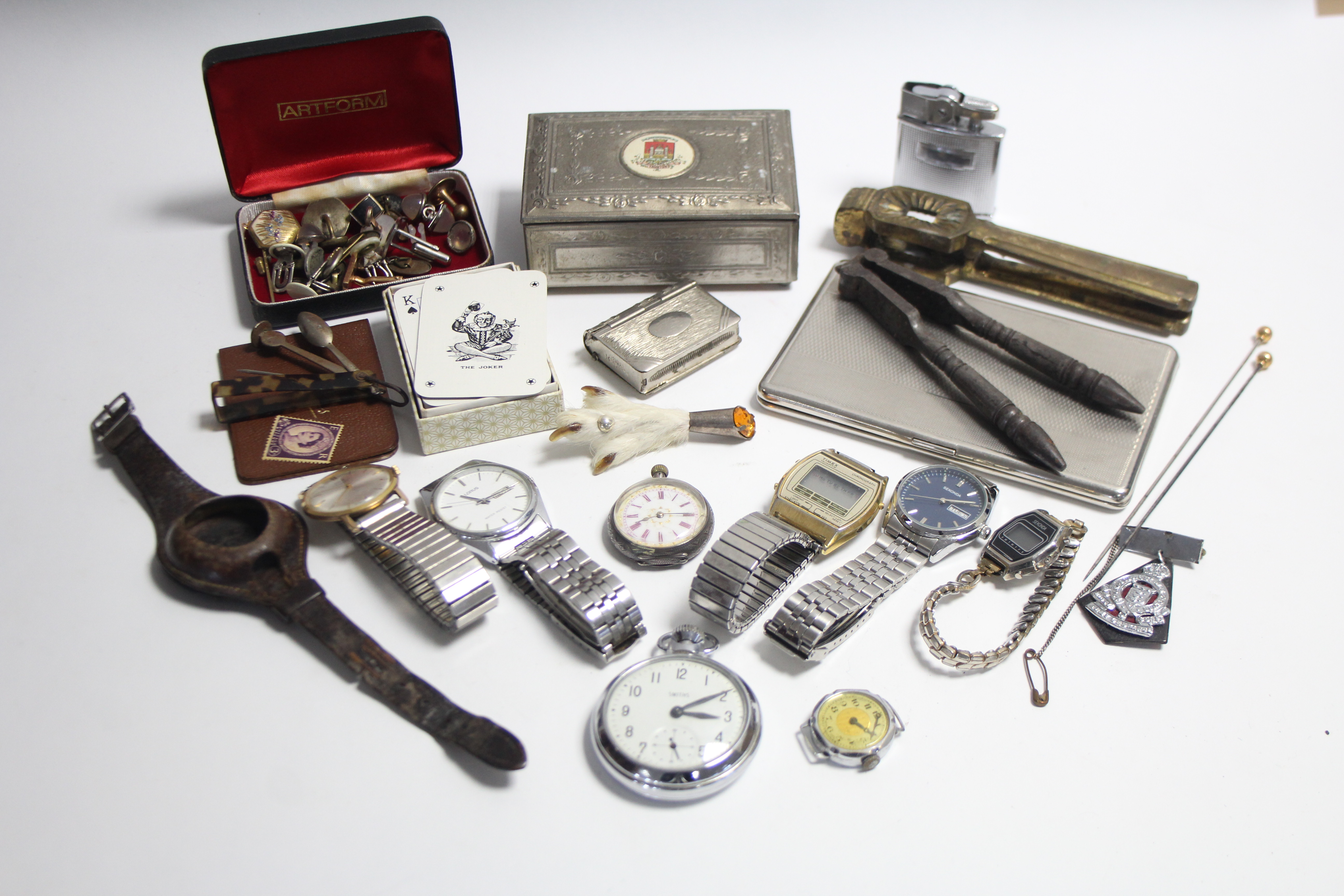 A ladies fob watch in .935 silver engraved case; a Smith’s chrome-cased pocketwatch; six various