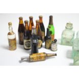 Ten various miniature bottles, most with contents; & twelve various glass ink bottles.