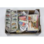 Various mixed cigarette & tea cards; & approximately three hundred & seventy various phone cards.