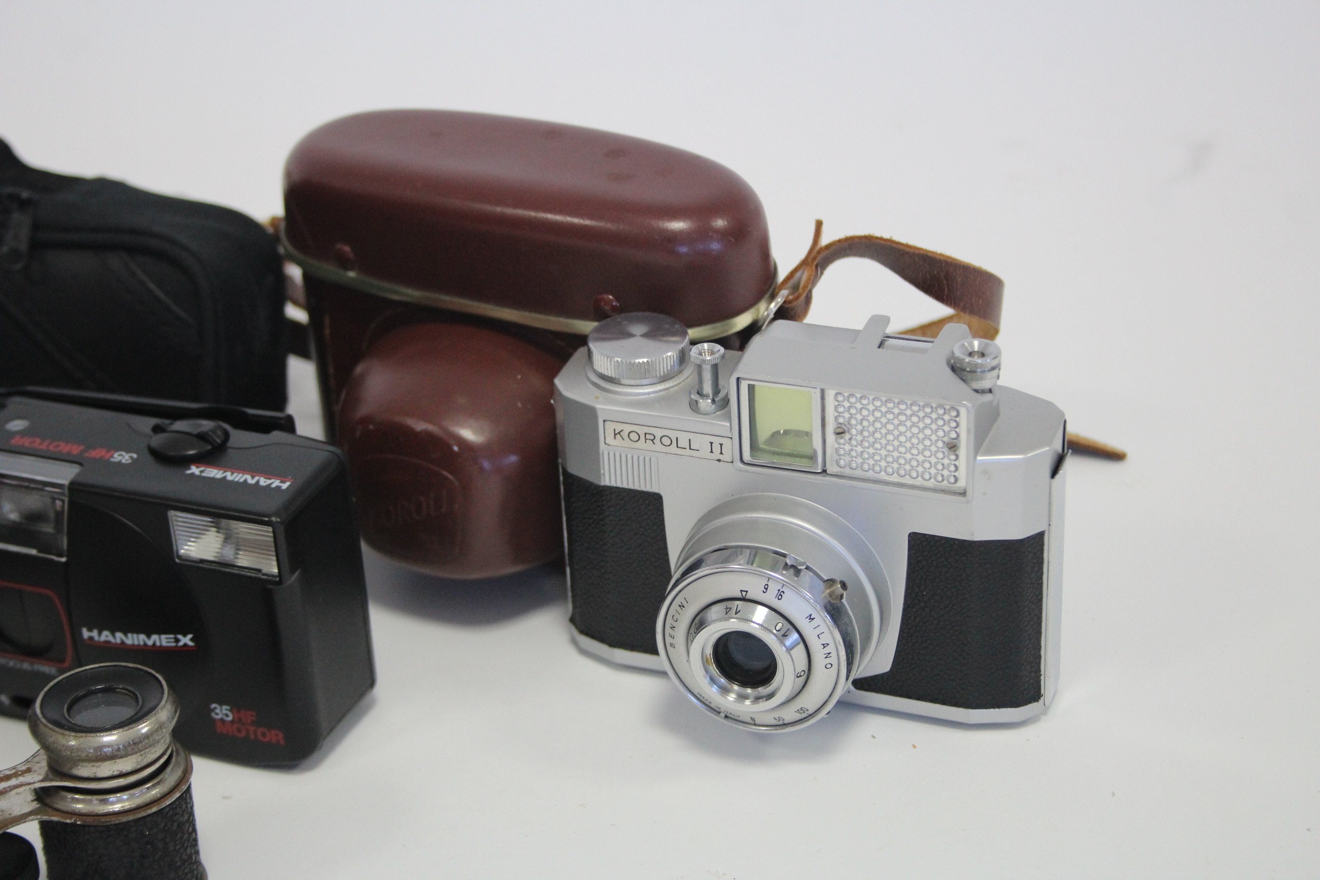 A pair of black lacquered brass field glasses with case; together with a pair of opera glasses; & - Image 2 of 2