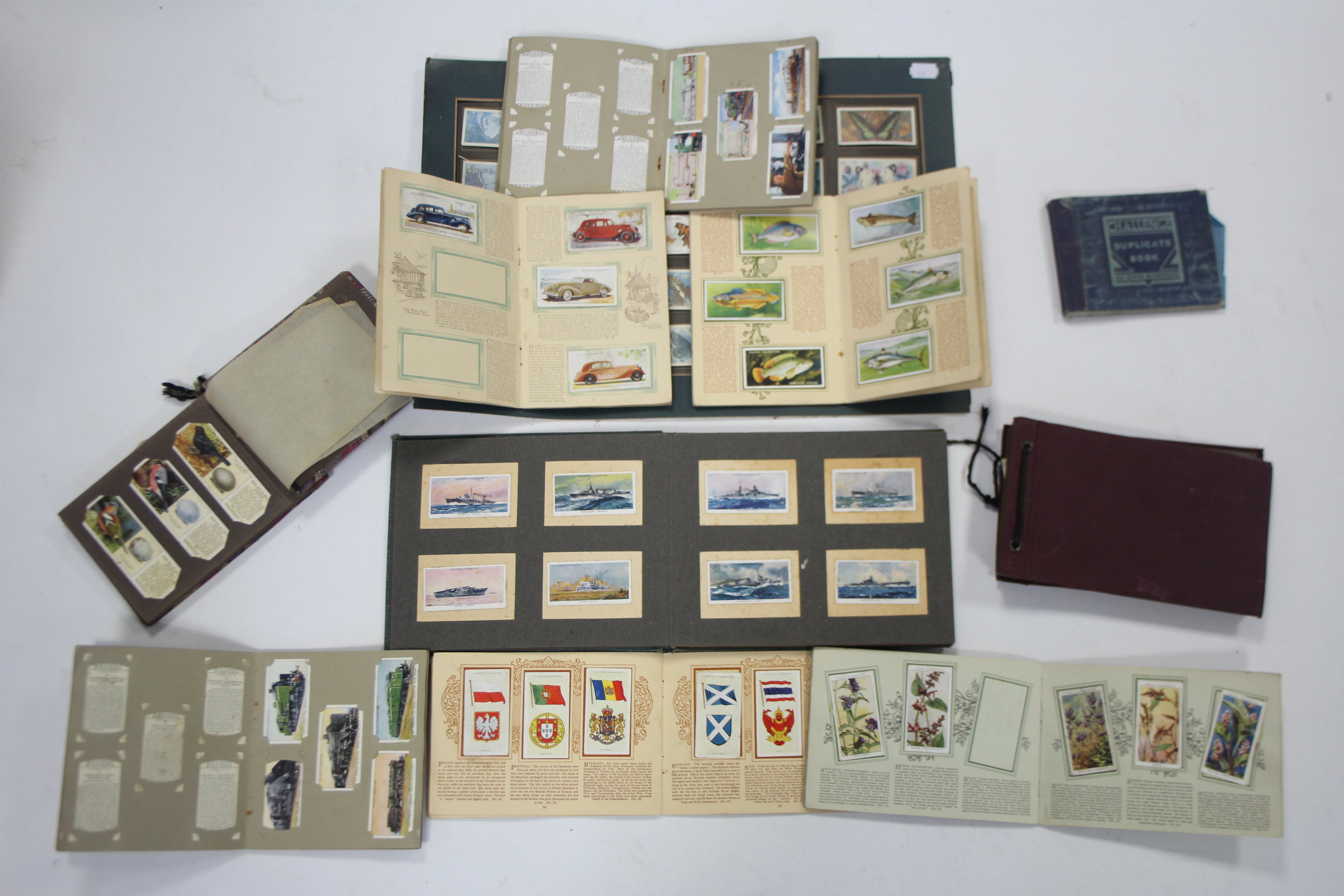 A collection of assorted cigarette cards contained in nine albums & loose. - Image 2 of 3