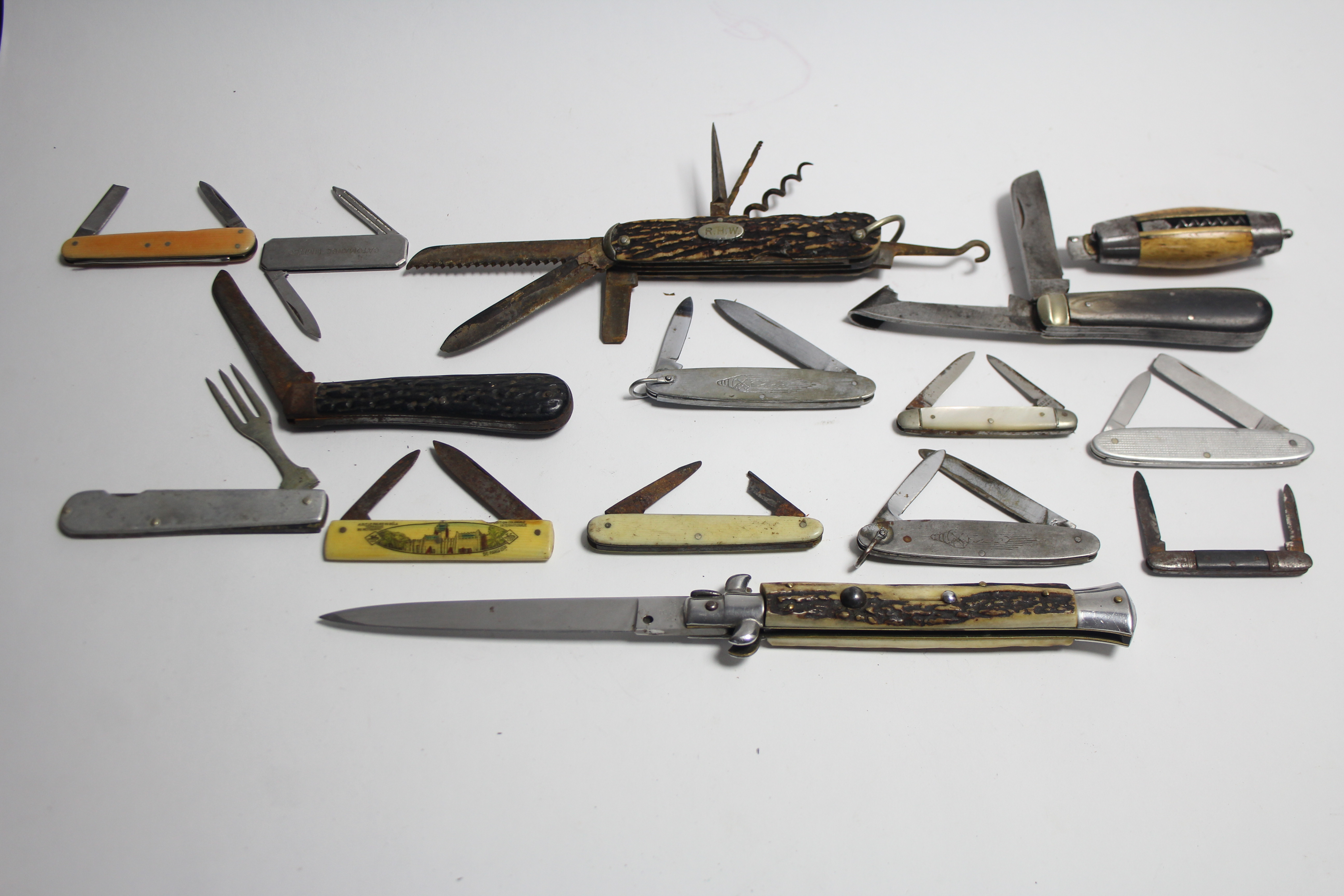 A 19th CENTURY SWEDISH BARREL POCKETKNIFE (blade stuck), 3” wide; together with fifteen various