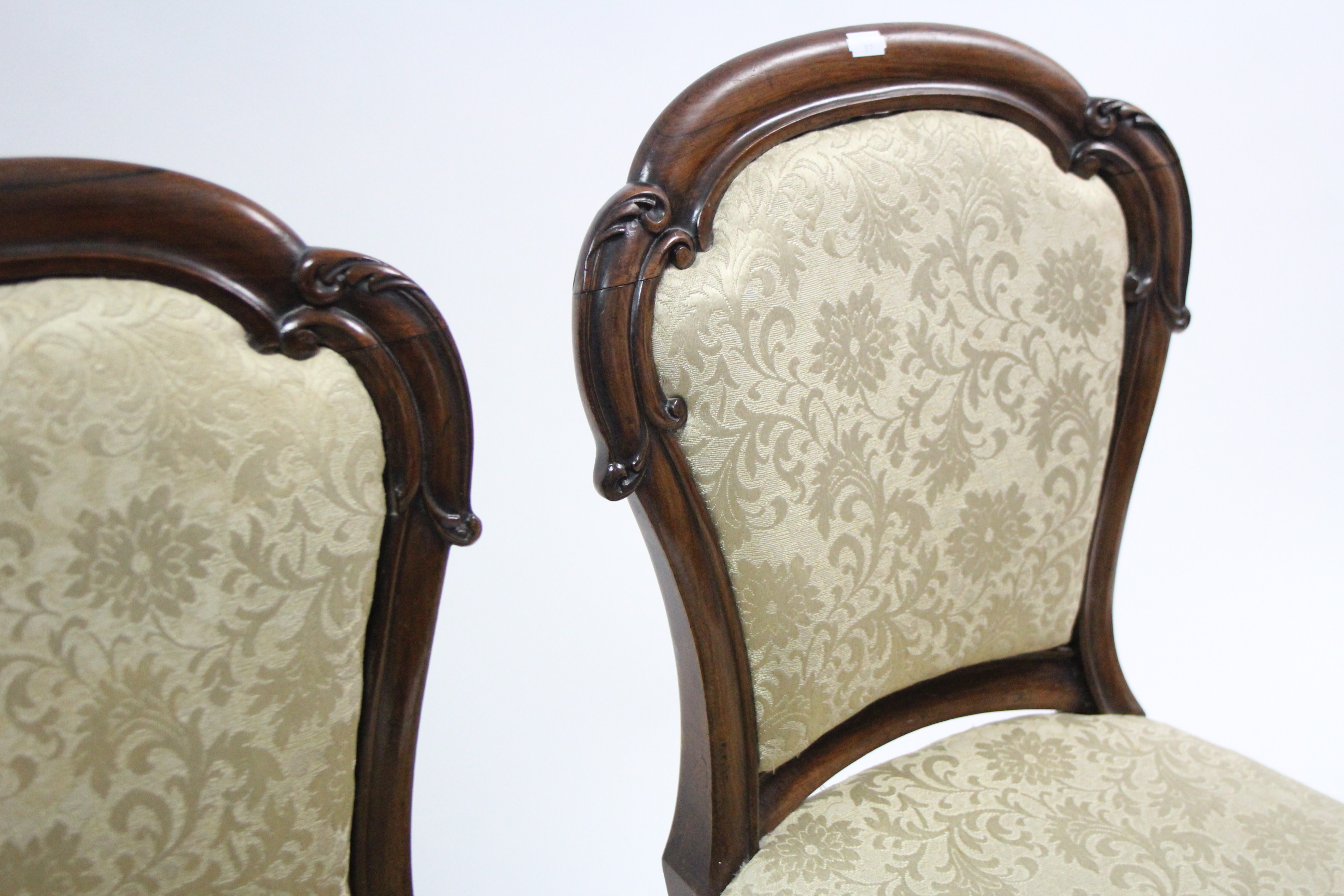 A set of four Victorian carved rosewood dining chairs, the padded balloon-backs & seats - Image 4 of 6