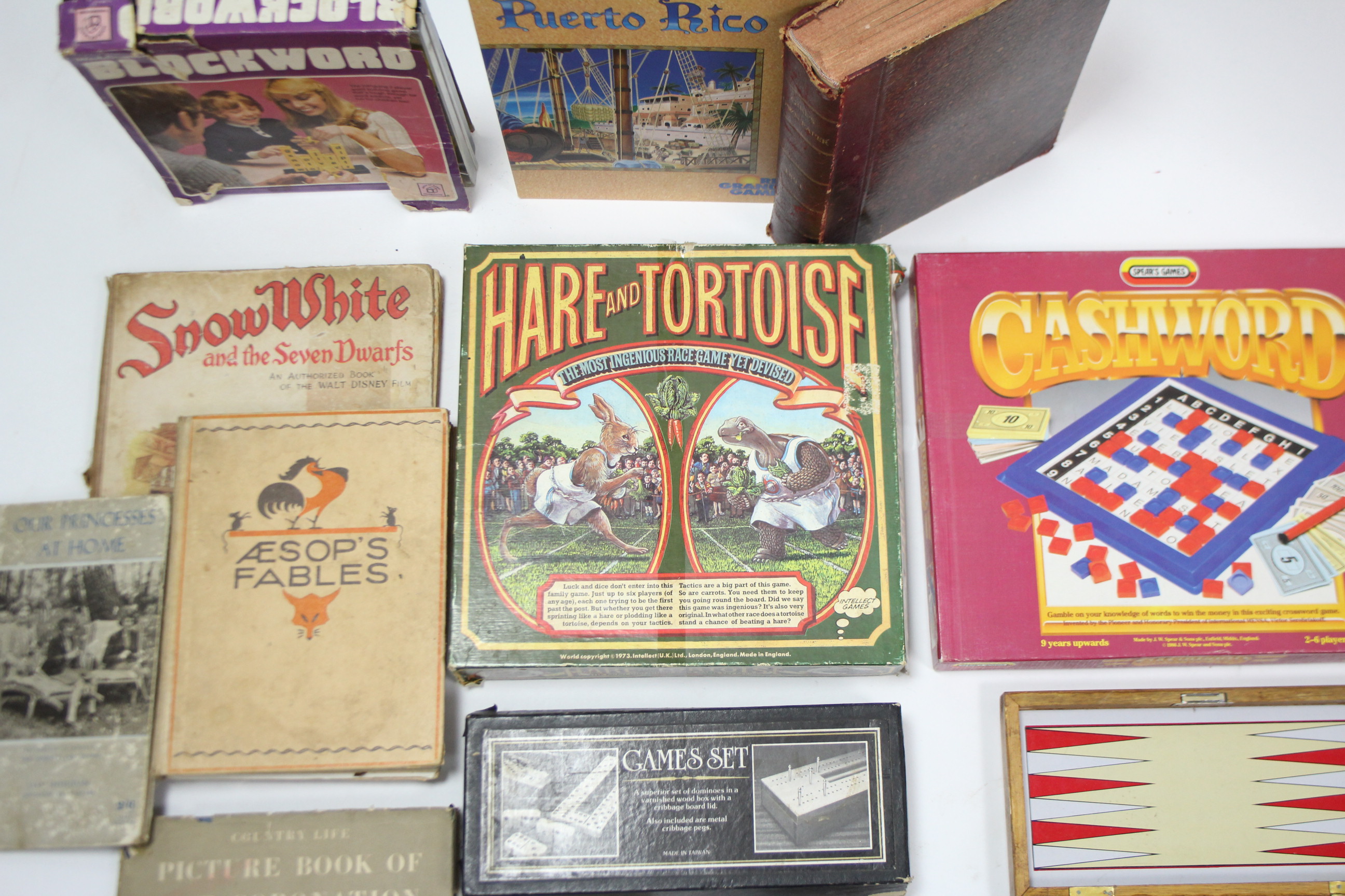A 1970’s Intellect Games board game “Hare and Tortoise”; together with various other games & books.