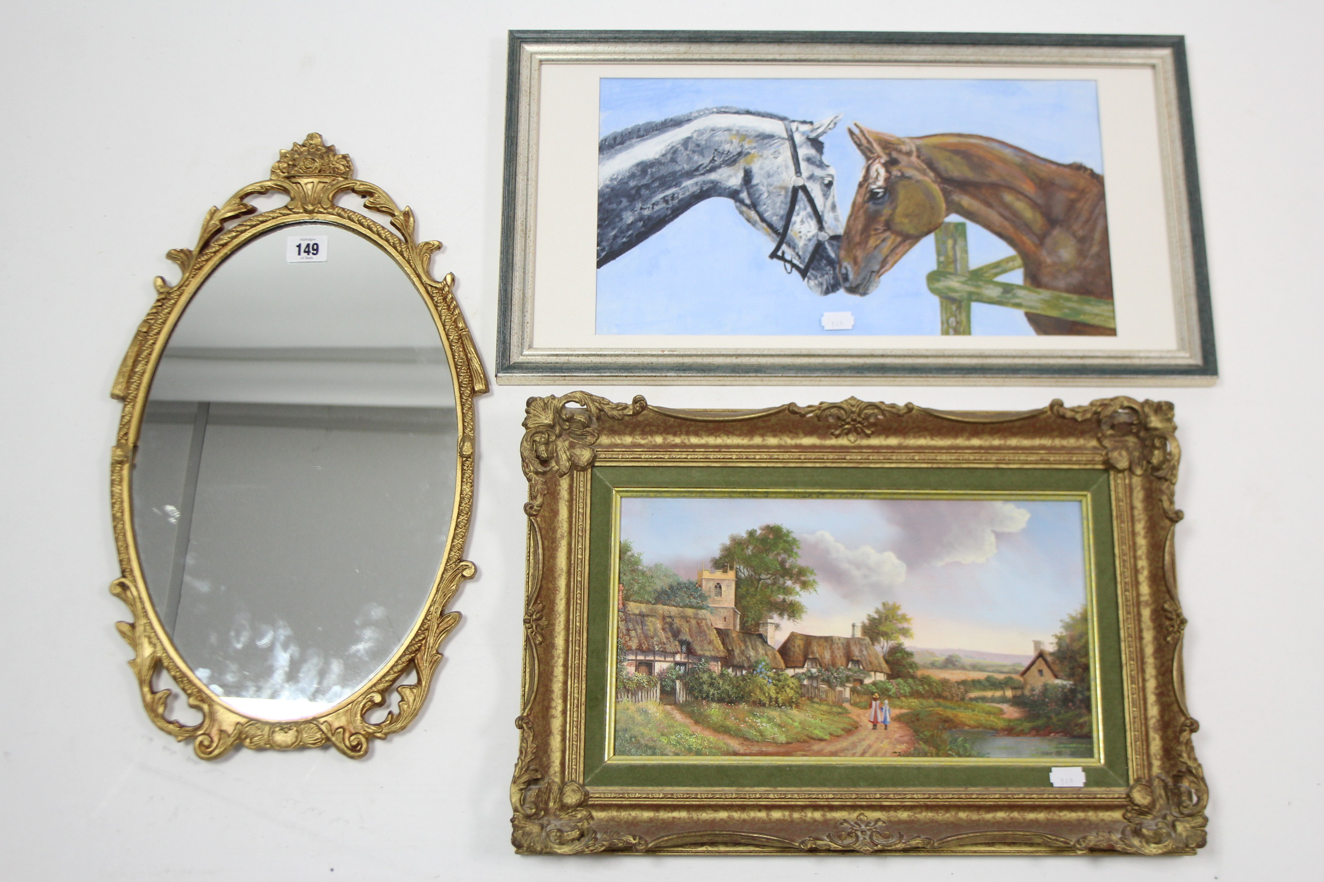 A gilt metal frame oval wall mirror, 19½” x 11”; 7 ten various decorative paintings, all framed.