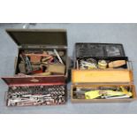 A quantity of assorted hand tools & accessories contained in four small trunks; & a Youngman’s