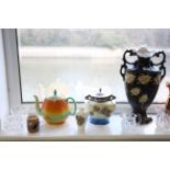 A Shelley pottery circular teapot of orange, yellow & green glaze; a copper lusterware jug; four