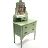 A pale green painted pine dressing chest with rectangular swing mirror to the stage back, fitted two