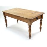 A VICTORIAN PINE KITCHEN TABLE with rounded corners to the rectangular top, fitted drawer to