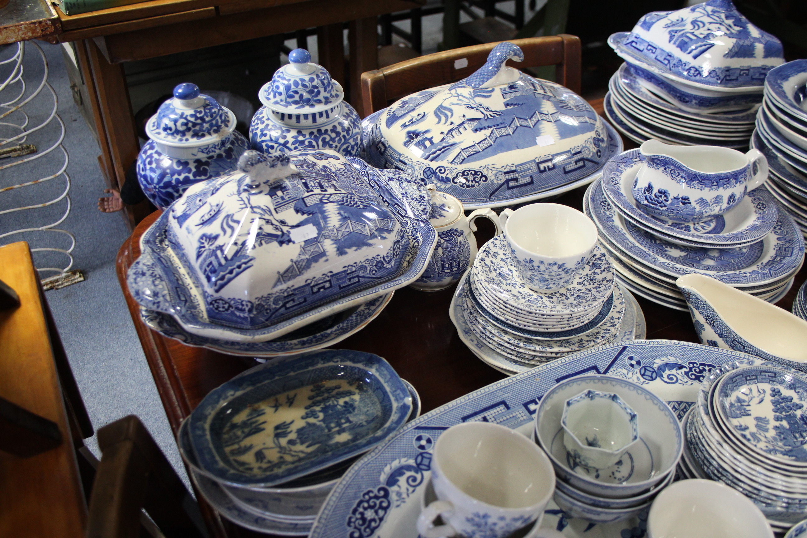 A Staffordshire pottery blue & white “Willow” pattern vegetable tureen; a similar meat plate; & - Image 3 of 4