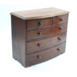 A Victorian mahogany bow-front chest fitted two-short & three long graduated drawers with turned