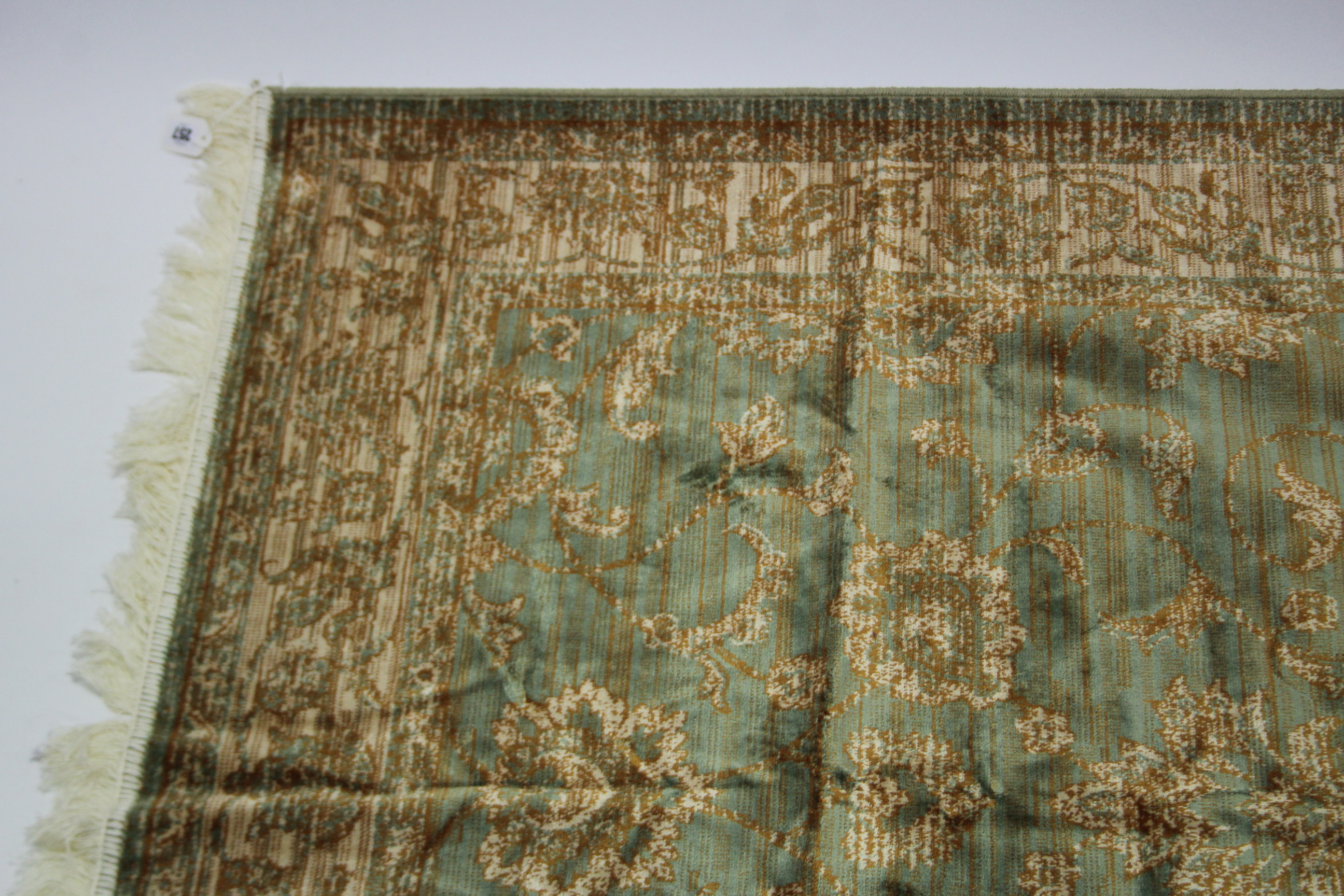 An eastern style rug of green & cream ground with all-over repeating geometric design to centre - Image 2 of 3