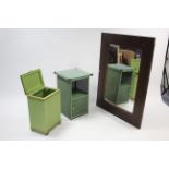 A green painted loom bedside cabinet enclosed by door with open recess above, 16” wide; together