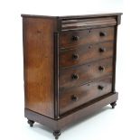 A VICTORIAN MAHOGANY LARGE CHEST, fitted cushion-fronted frieze drawer above four long graduated