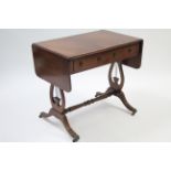 A reproduction inlaid mahogany sofa table fitted two frieze drawers to one side, & on lyre-shaped