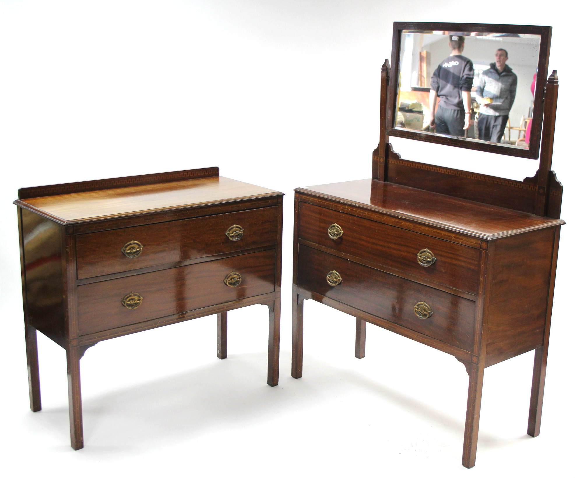 An Edwardian inlaid-mahogany bedroom pair comprising a dressing table, & a two-drawer chest of