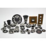 Twenty seven items of Wedgwood black & white jasperware.