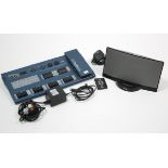 A Bose “Sound Dock” digital music system with remote control; & a Digitech “RP6” signal processor.
