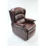 A brown leather reclining armchair.