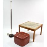 A brown vinyl buttoned square pouffe; a standard lamp; & a Danish tile-top coffee table, 27” wide.