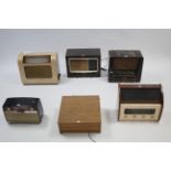 A vintage Marconi value radio in wooden case; together with four other vintage valve radios, & a