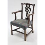 A Georgian mahogany carver chair with pierced splat back, padded seat & on square chamfered legs